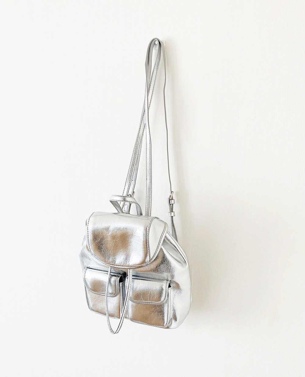 pocket silver backpack