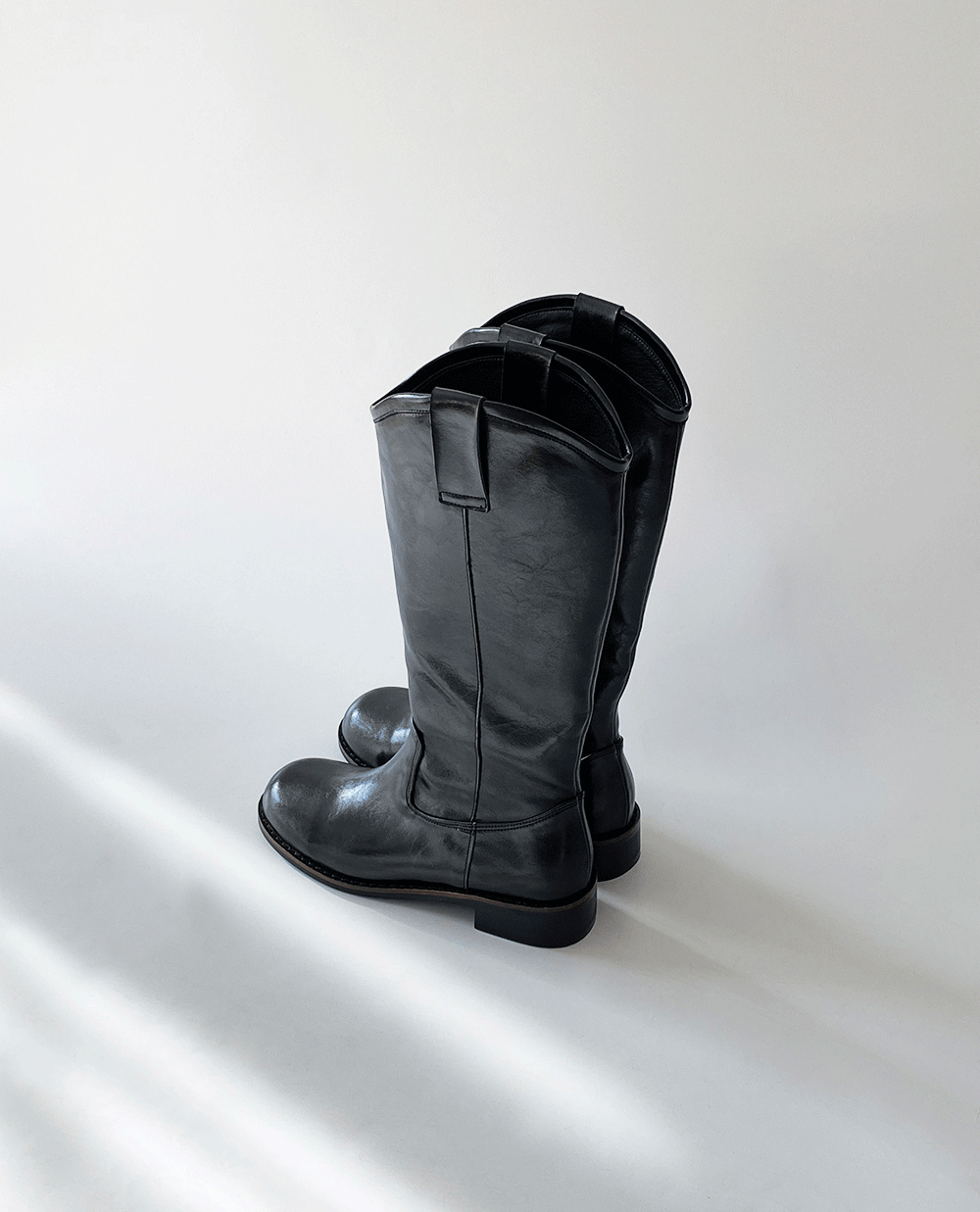 minimal black long boots